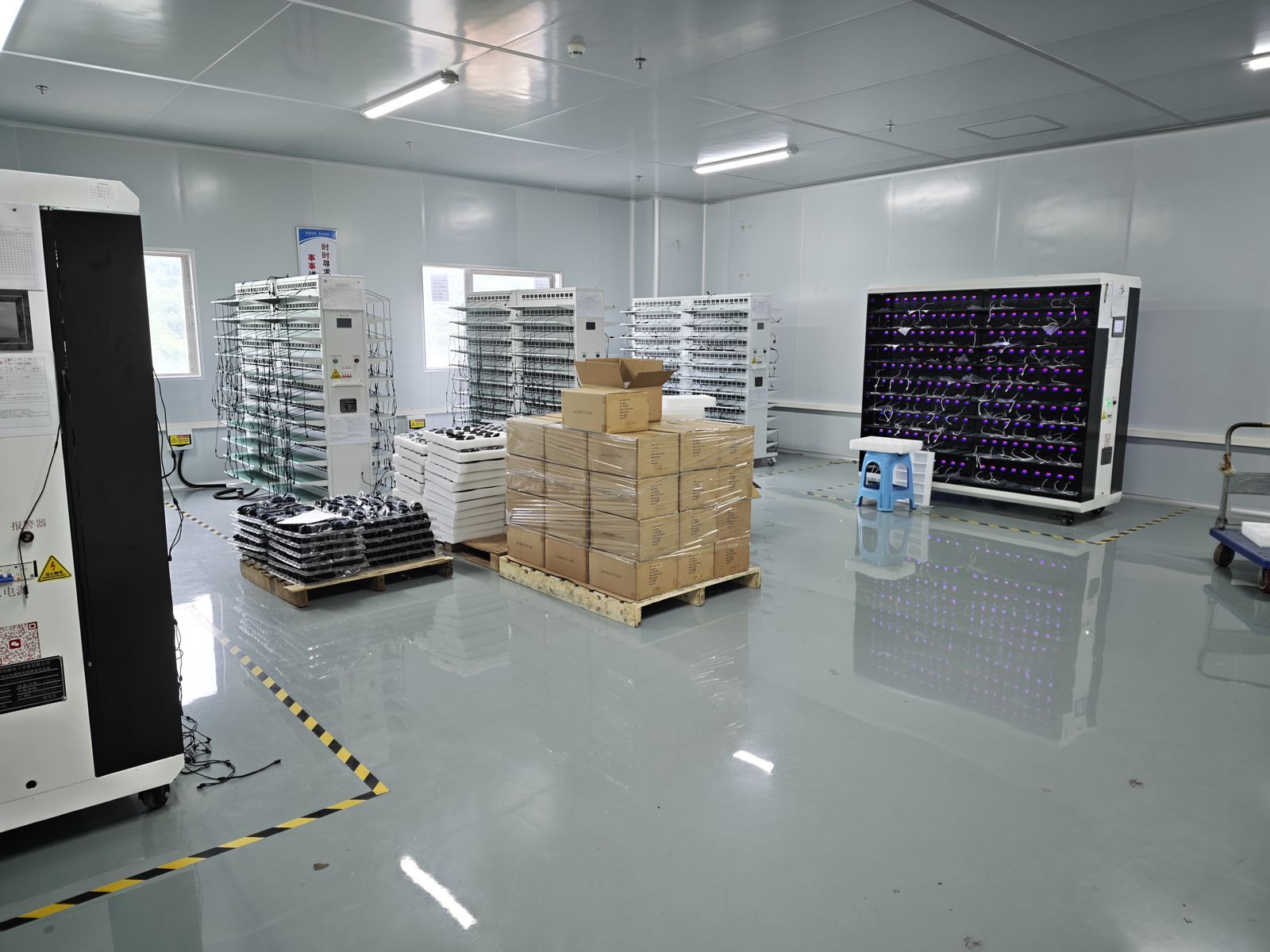Material racks inside the aging room at YHR Technology factory