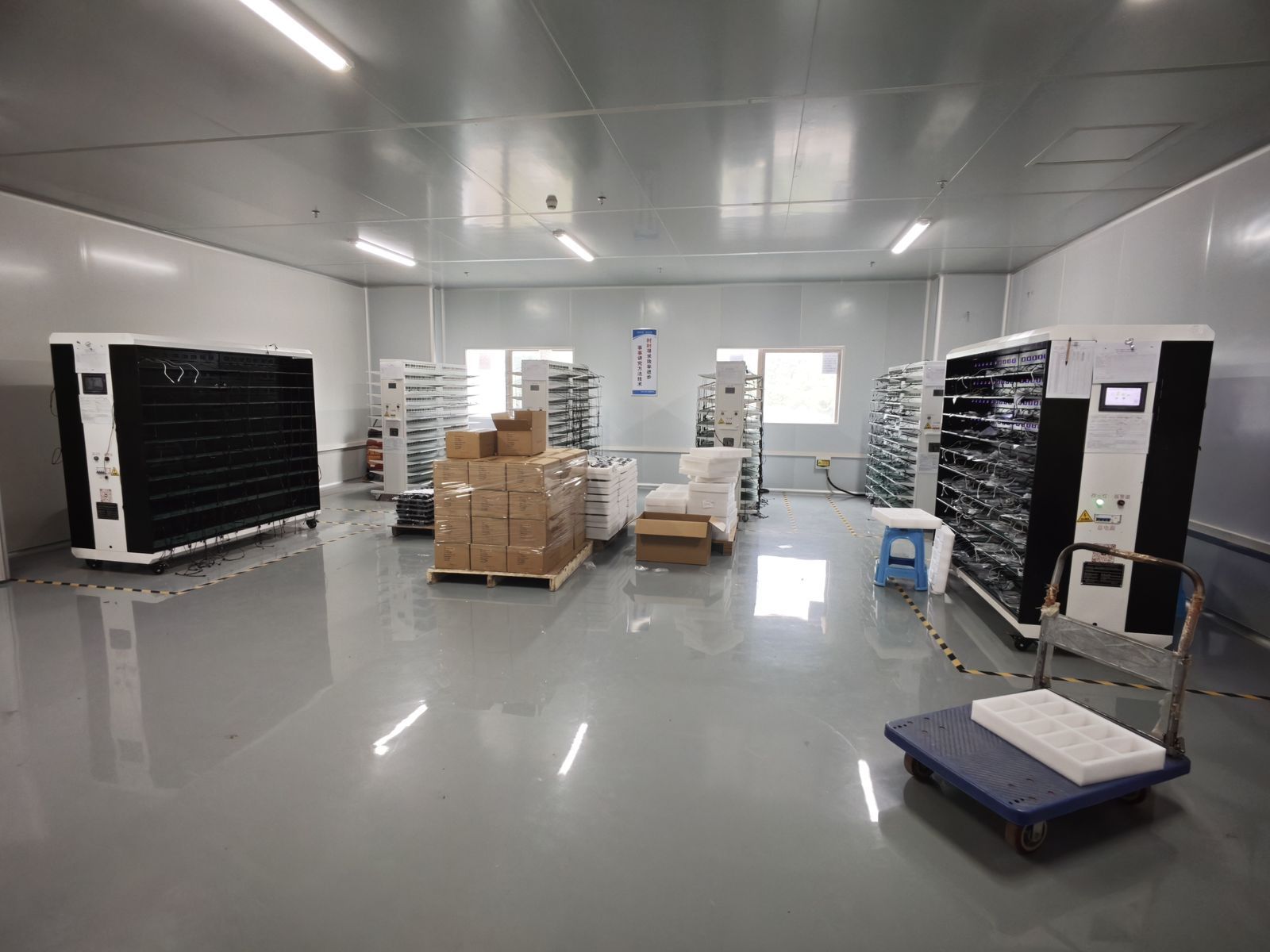 Aging test racks for mass production units in YHR Technology aging room