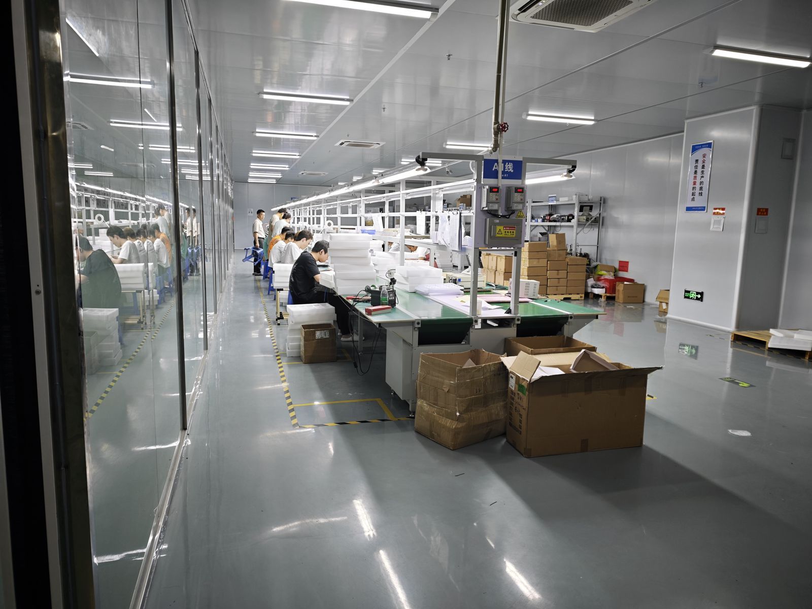Smart glasses assembly line workstations at YHR Technology factory